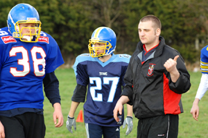 CoachRobertsandgladiatoryouthplayers_300_1.jpg